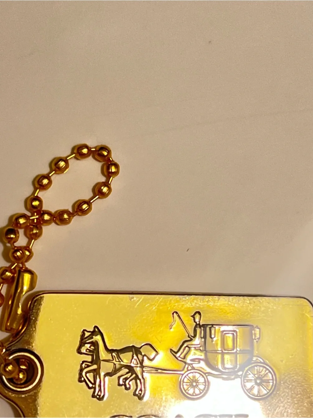 Very Rare Vintage Coach Gold Horse & Carriage Tag Key Holder and bag charm.